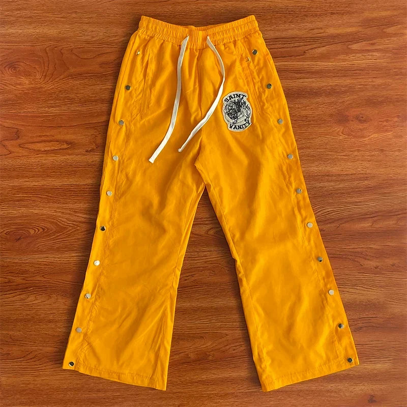 SAINT VANITY Embroidered Rivet Sports Style Casual Windbreaker Pants - Yellow